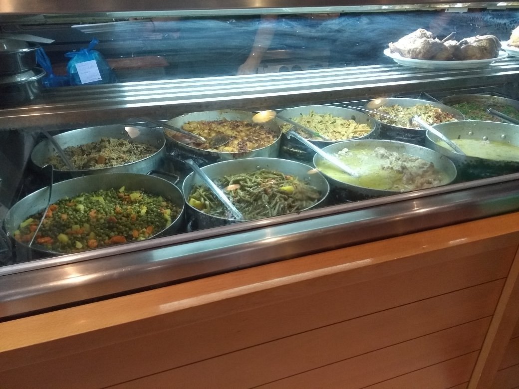 The 5Φ counter at 11:45, trays loaded with the day's cooking